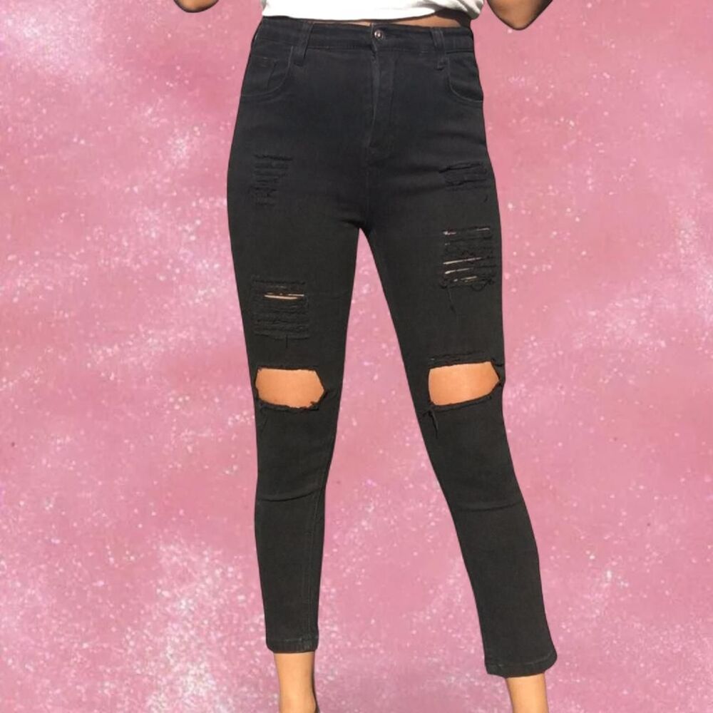 Distressed high-waisted skinny jeans